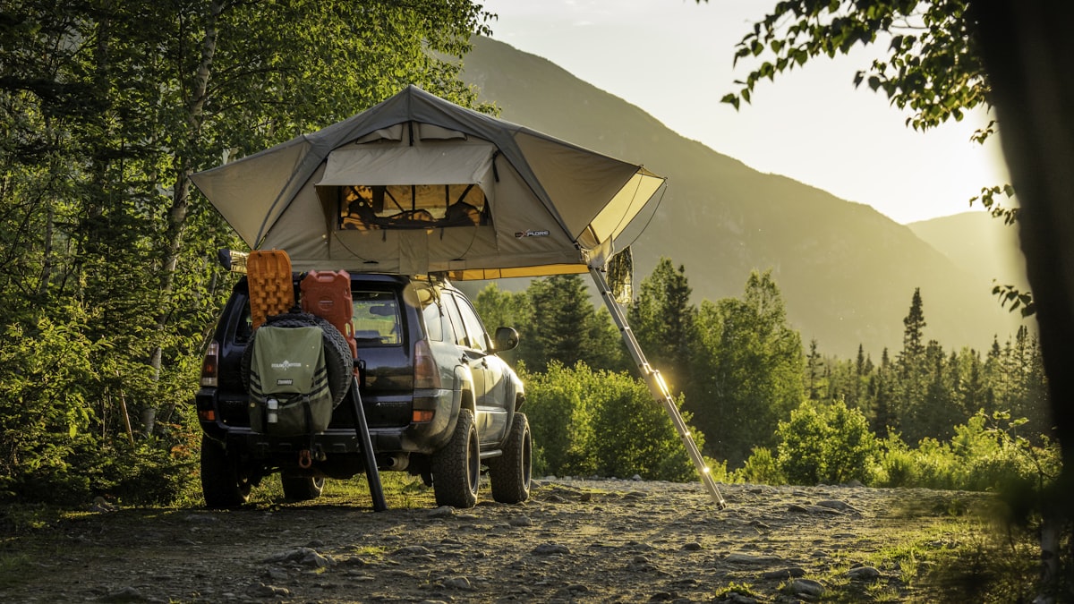 Car camping lifestyle with SUV and camping chair